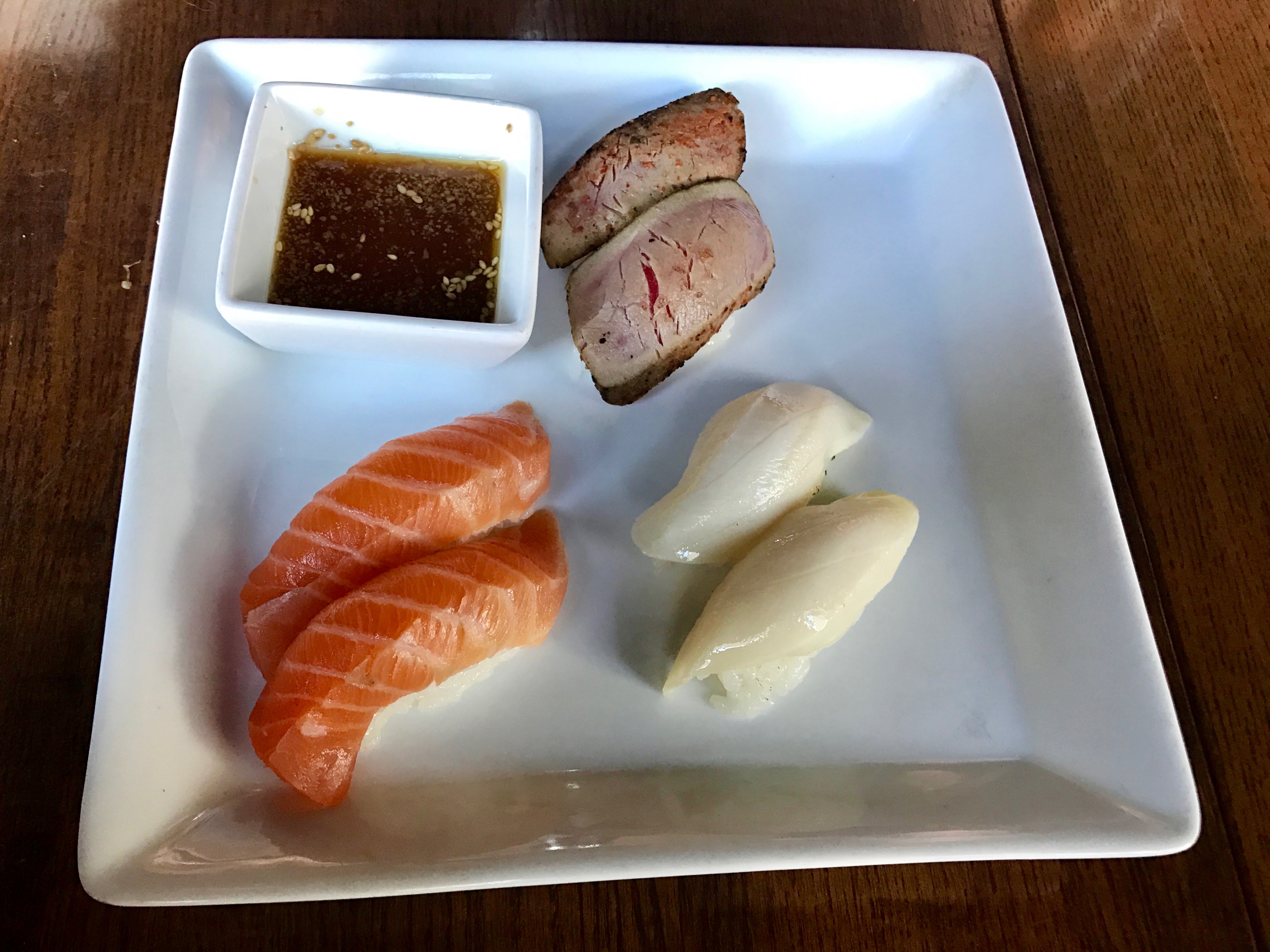 seared albacore, escolar, and salmon nigiri