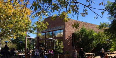 exterior of PIzzeria Bianco with customers seated outside