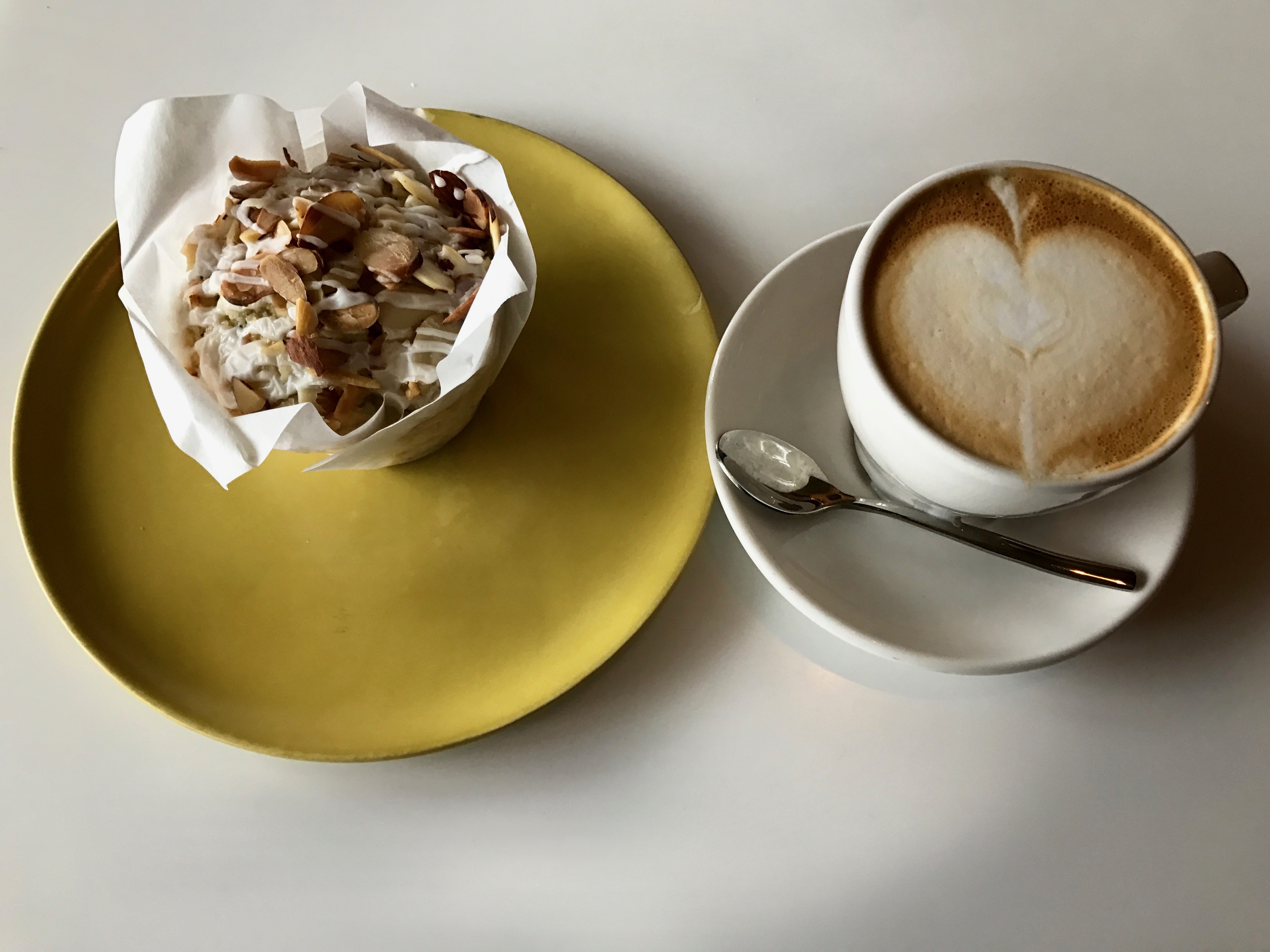 almond poppyseed muffin and cappuccino