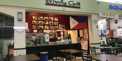 view of Wholly Grill from the food court