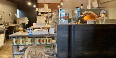 view of Myke's PIzza from inside Cider Corps