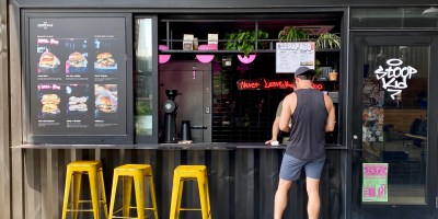 person ordering at the counter of Stoop Kid