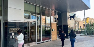 exterior of Blue Hound with people walking outside