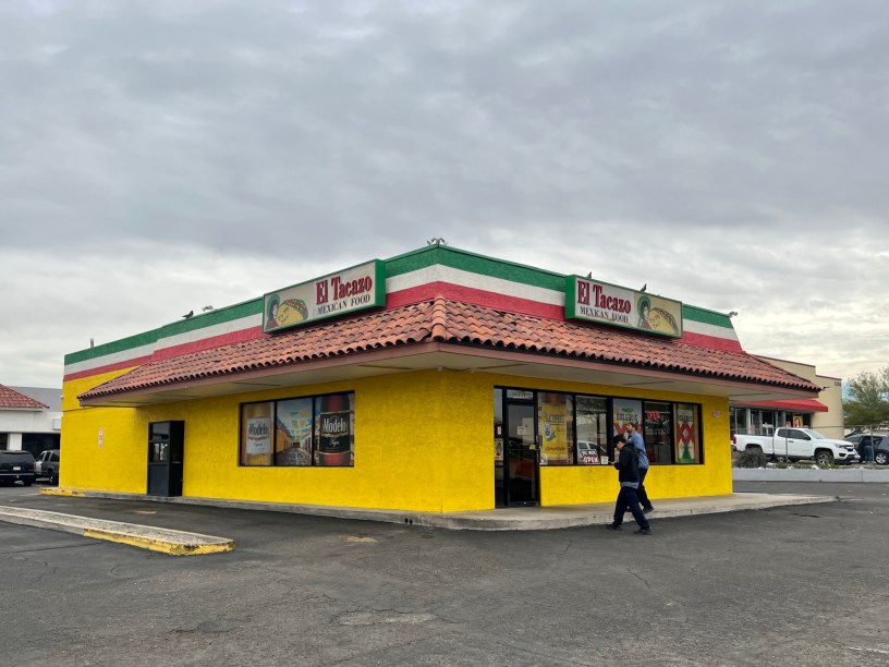 exterior of El Tacazo with customers walking towards the entrance